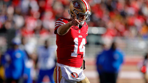 San Francisco 49ers quarterback Sam Darnold (14) celebrates after a play during the second quarter against the Los Angeles Rams at Levi's Stadium.